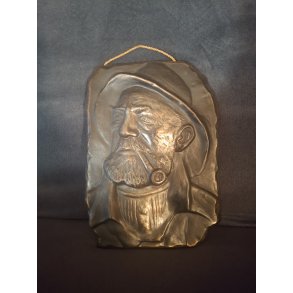 Skipper med pibe relief